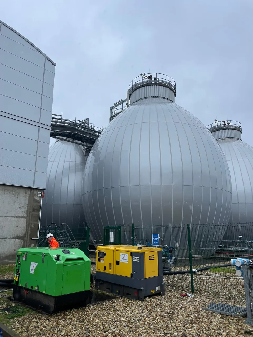 Robotic jet washing unit cleaning the interior of a digester tank at a Thames Water facility