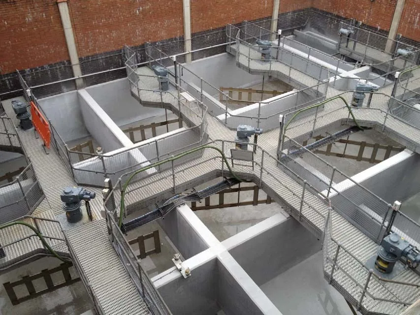 Aerial view of refurbished concrete treatment tanks at Ashford Water Treatment Works